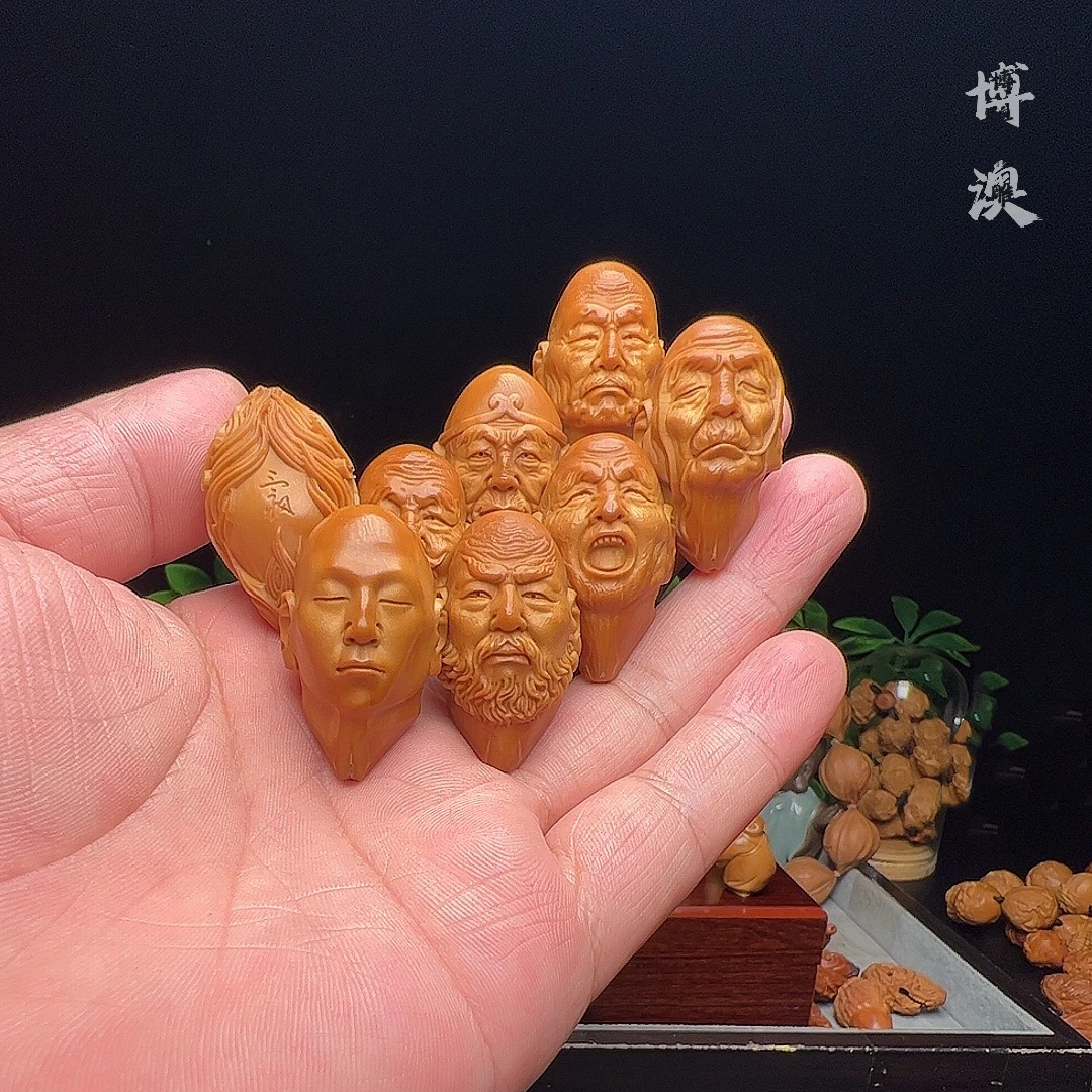 橄榄核七星罗汉之无上尊超写实风格橄榄核手串文玩核雕精品收藏