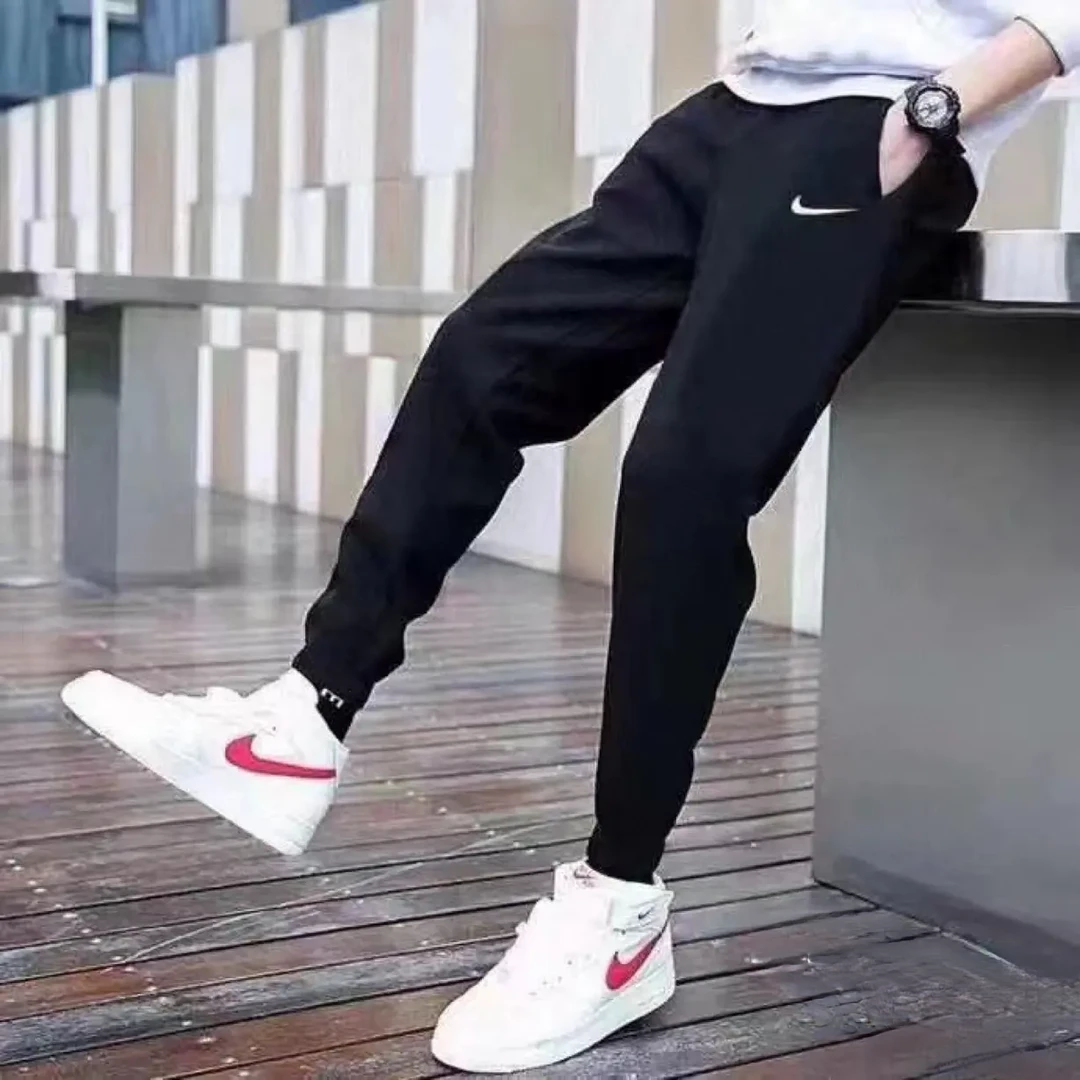 耐克NIKE 男士经典百搭梭织运动长款秋冬潮流宽松型休闲裤CZ2855