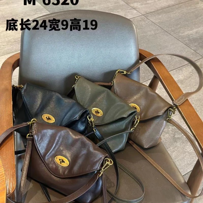 6320牛皮斜挎邮差女包多隔层双肩带