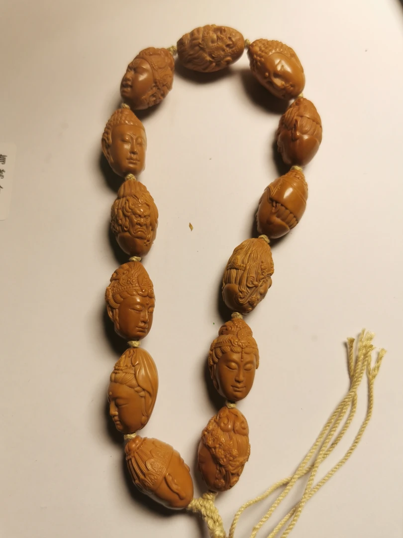 橄榄核万佛手持CL12