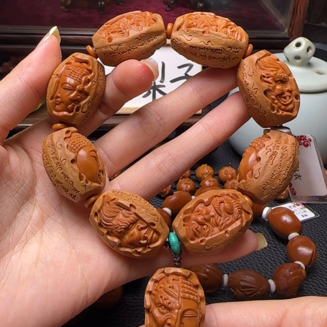 【闪购商品】橄榄核把件包衣佛魔一念