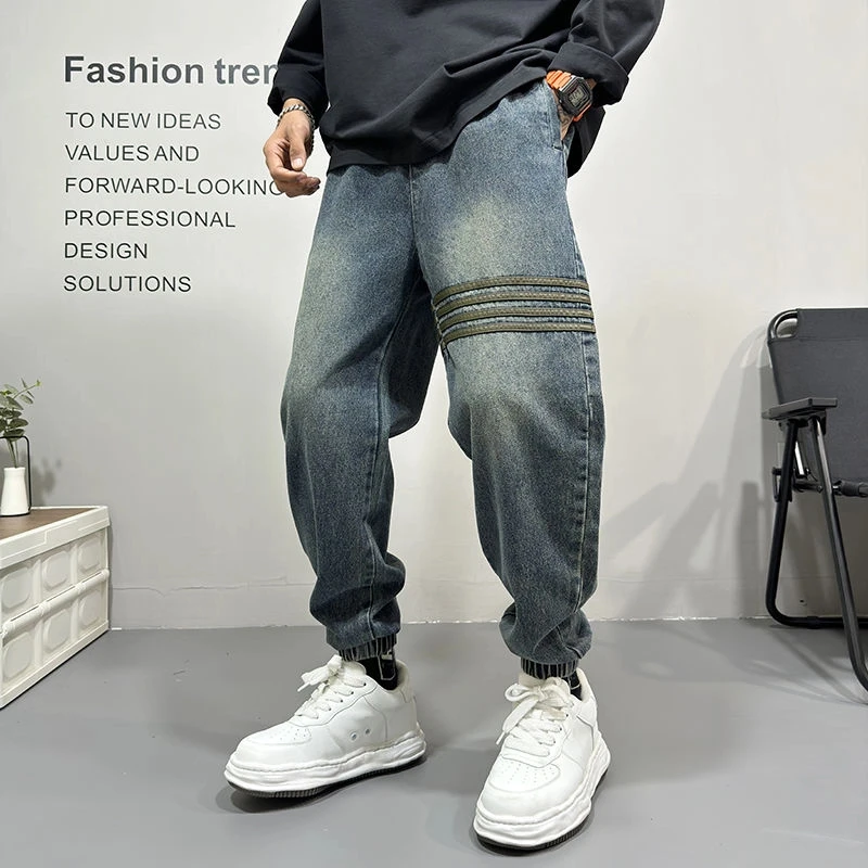 美式复古重磅工装牛仔裤男士秋季新款宽松潮牌拼接休闲束脚哈伦裤