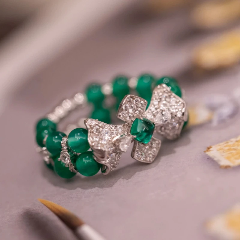 铜合金合成锆石戒指 5905蝴蝶结绿色珠珠新中式轻奢显白弹力戒指