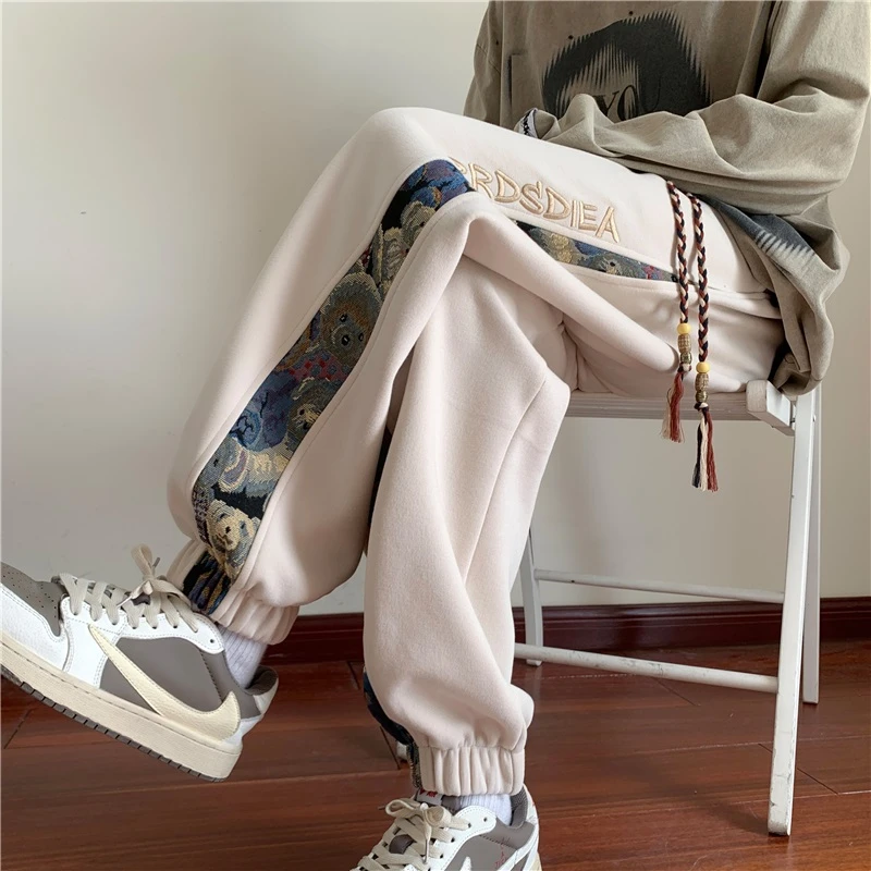 @秋季新款民族风刺绣卡通休闲长裤男潮流彩色抽绳束腰小脚裤子