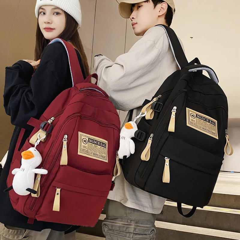 书包男生大学生高中学生女生初中生大容量小学生结实耐用双肩背包