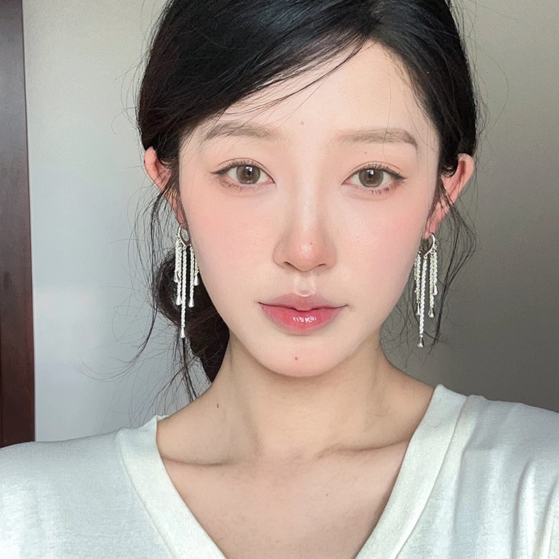 oushipei/欧诗佩 铜合金耳饰 流动的光清冷长款流苏耳环气质耳扣