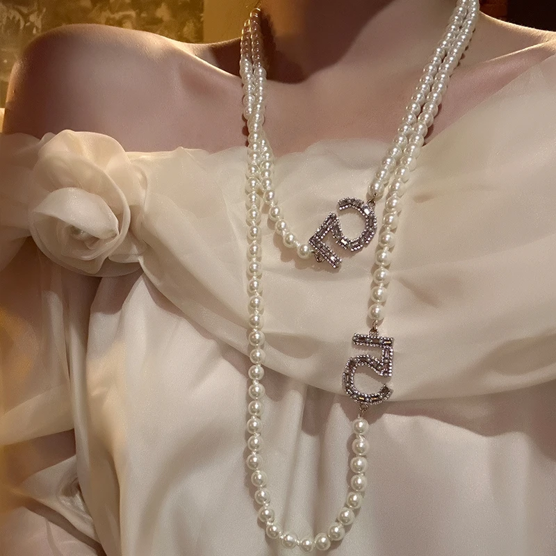 oushipei/欧诗佩 铜合金仿珍珠项链 轻奢小众长款叠戴珍珠项链女