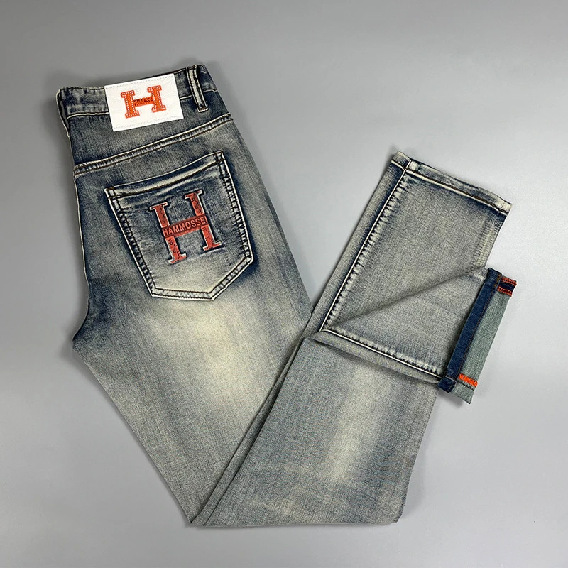 路约威格欧洲站高端休闲牛仔裤男士春夏款修身直筒弹力烫印长裤子