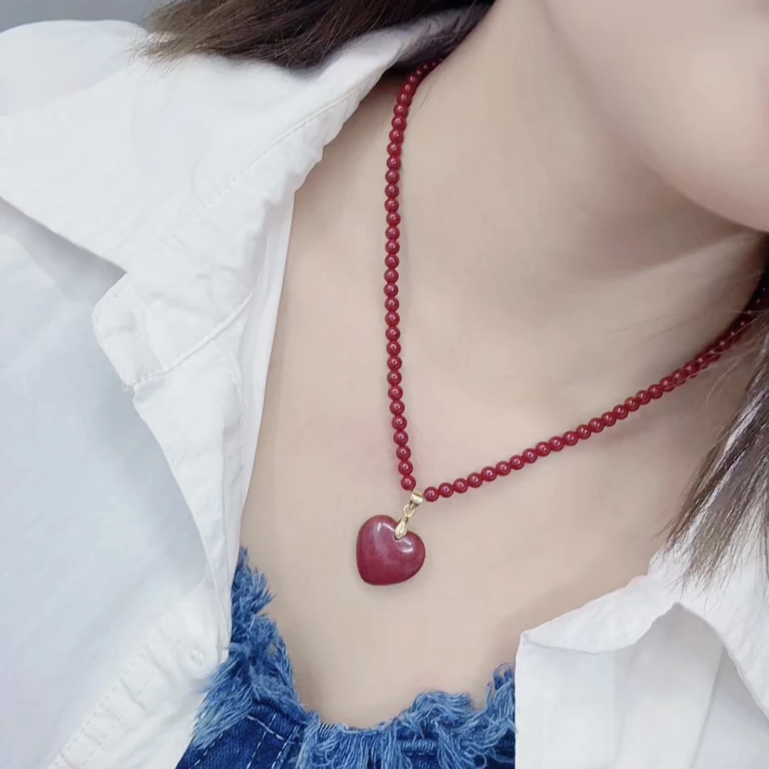 含辰砂工艺品含辰砂工艺品紫金色爱心全珠链