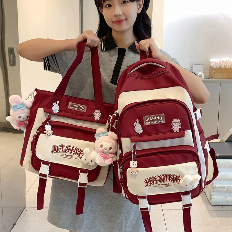 新款书包女小学生三到六年级校园背包初中生高中外出高颜值双肩包