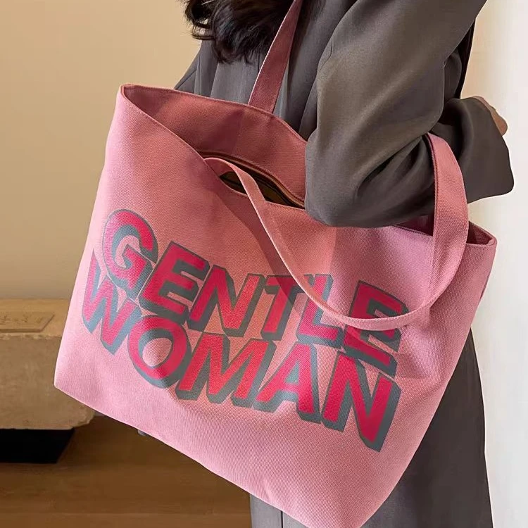 慵懒风粉色单肩帆布袋包包女2024新款学生上课通勤包大容量托特包