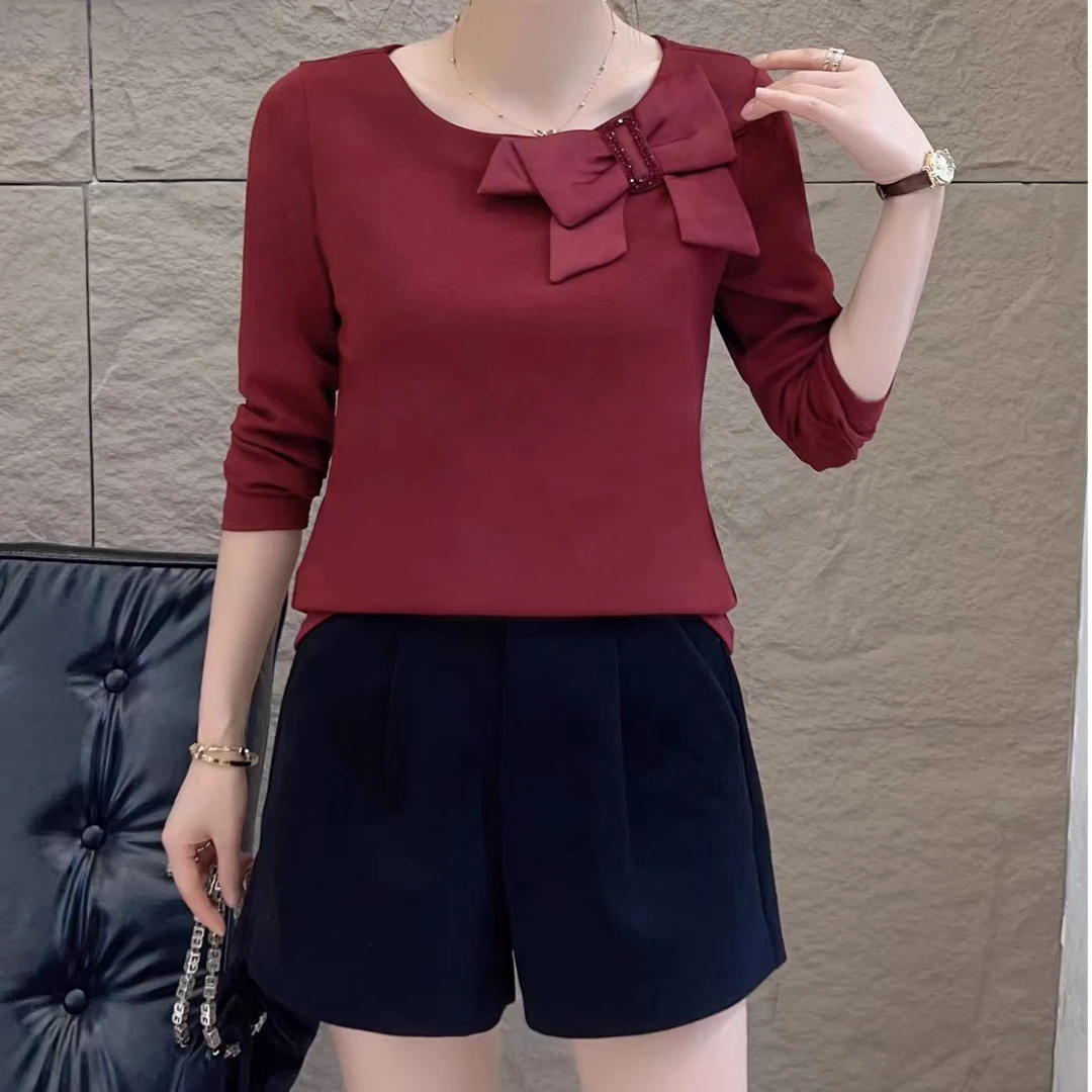 小施家气质女人味蝴蝶结闪钻显痩上衣68885