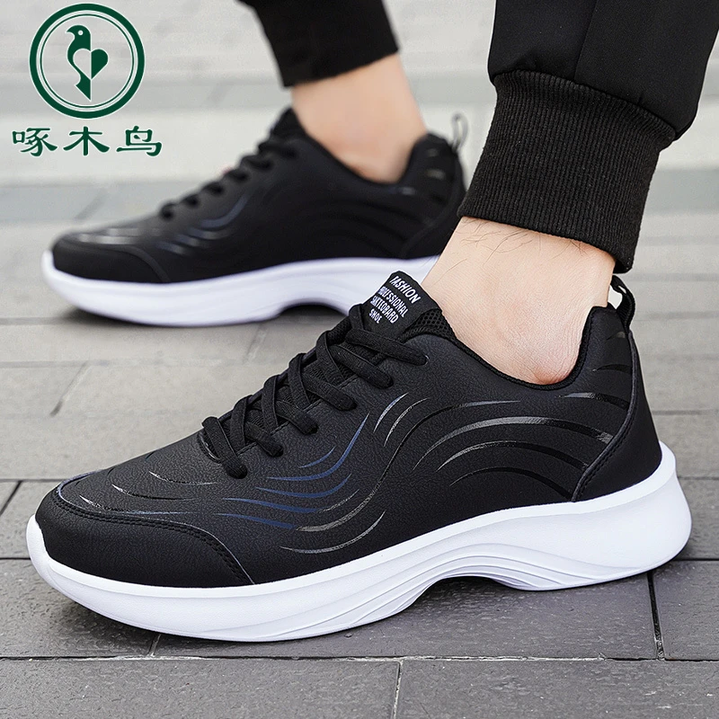 啄木鸟男鞋时尚男鞋黑色皮面防水运动鞋男防滑休闲跑步鞋男鞋