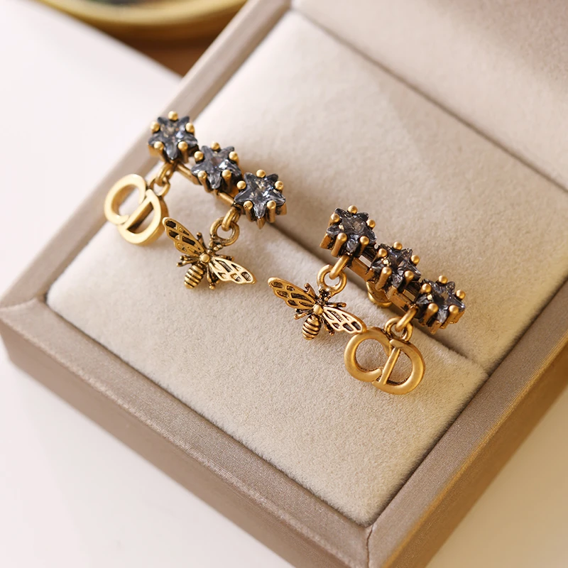 铜合金合成锆石耳饰 925银针轻奢百搭镂空满微镶cd耳钉AAA