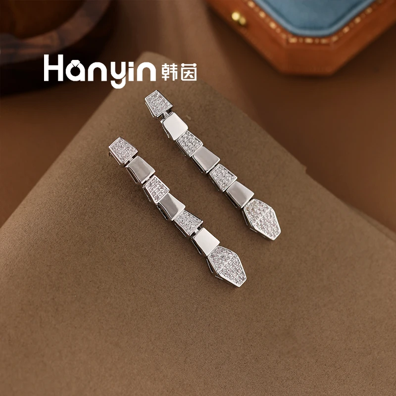铜合金合成锆石耳饰 925银针气质光面微镶灵动蛇节长流苏耳钉AAA