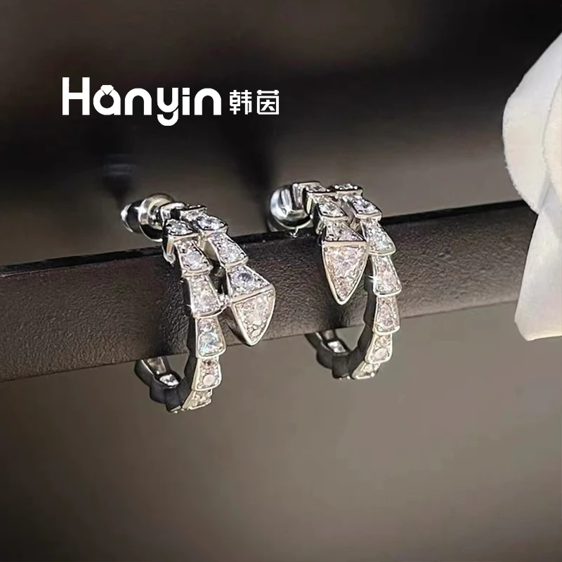 铜合金合成锆石耳饰 925银针满微镶蛇节设计时尚C型耳钉AAA