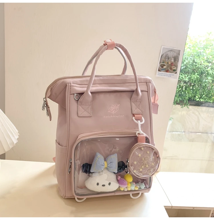 日系时尚百搭大学生背包书包2024新款双肩包女少女初中生痛包手提