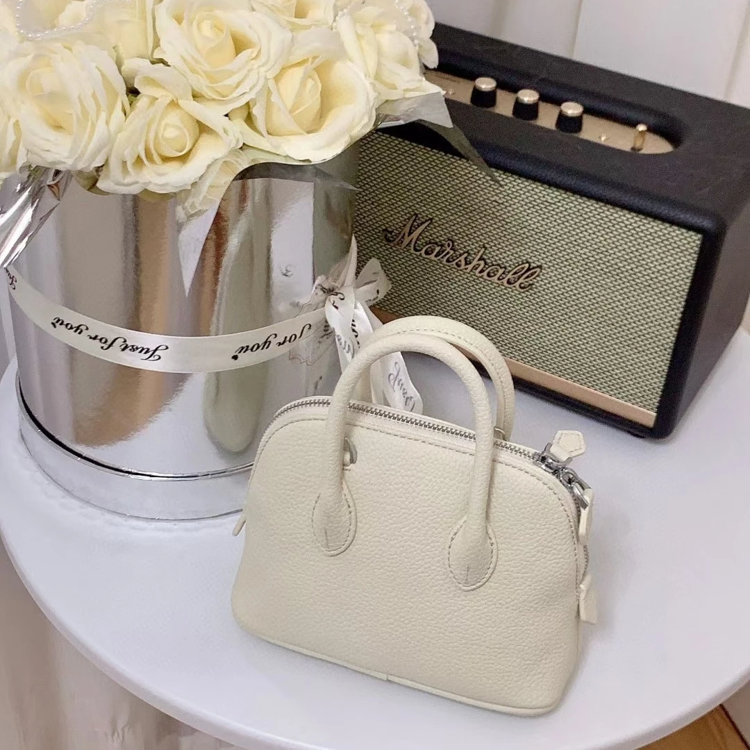 20cm荔枝纹保龄球贝壳包时尚百搭轻奢简约风手提包单肩包斜跨包