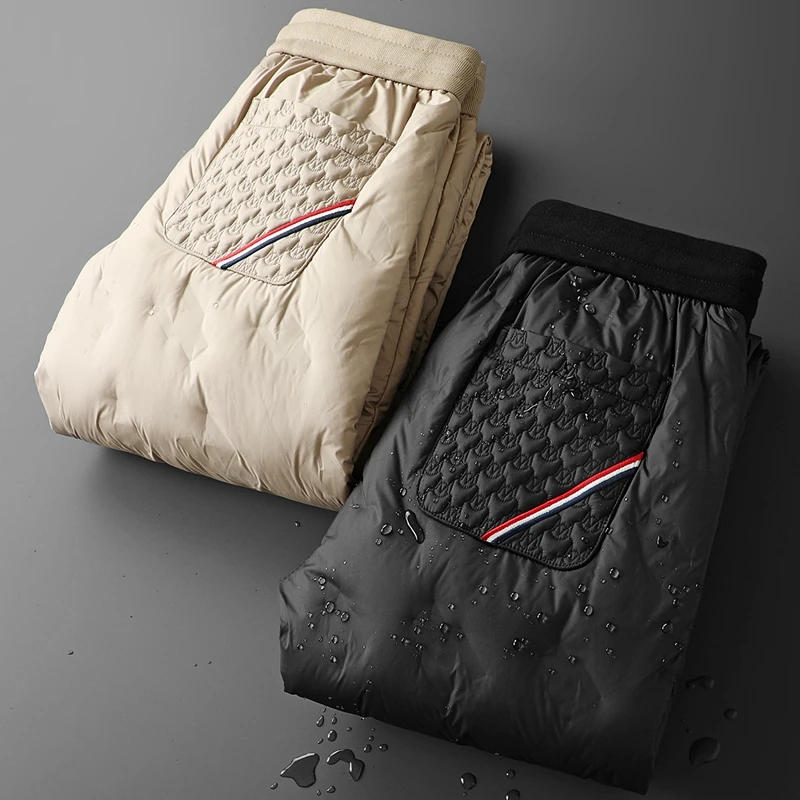 高端冬季御寒时尚防水羽绒裤男士户外东北保暖羽绒休闲裤男大码帅