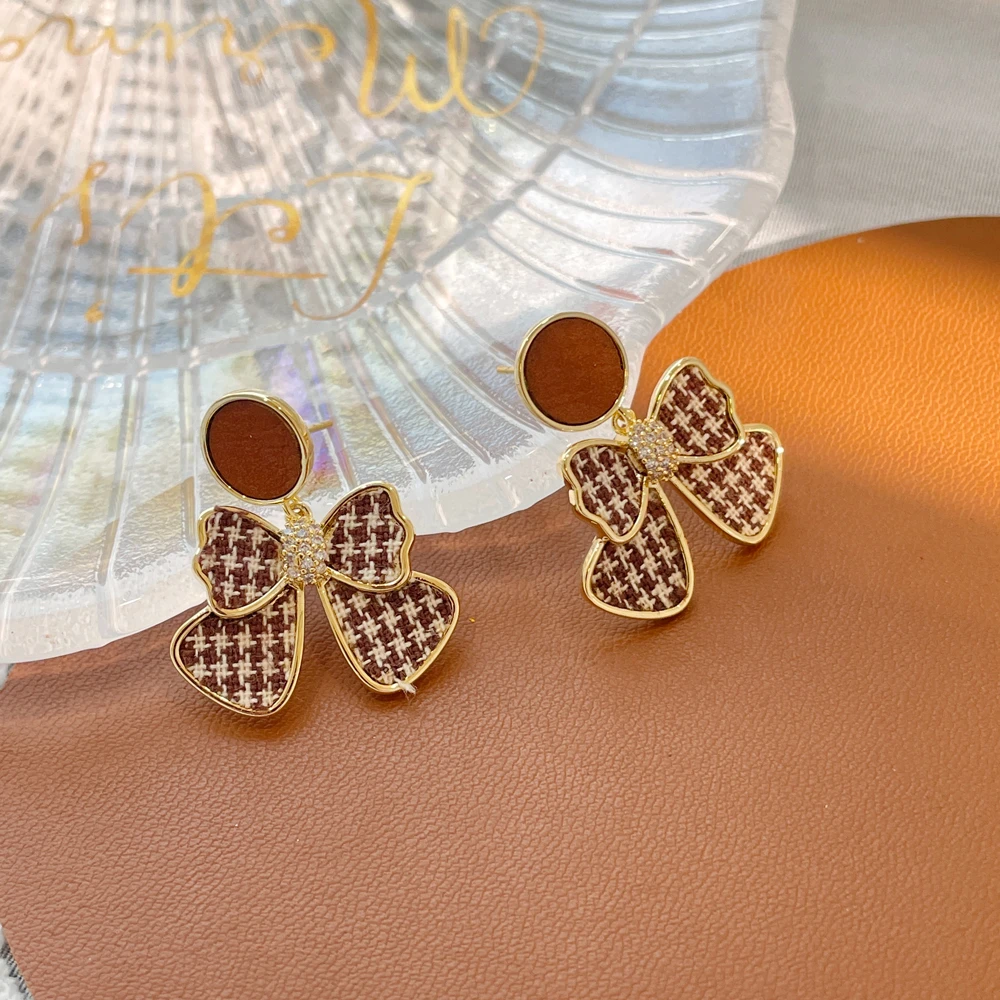 铜合金合成锆石耳饰 灵动蝴蝶结吊坠耳钉女轻奢气质百搭耳环-C217