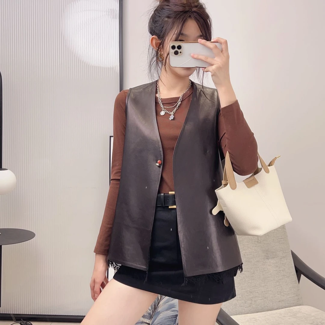 HX114 下摆蕾丝花边皮背心