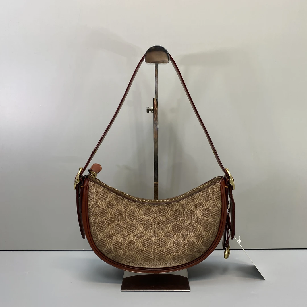 95新 COACH/蔻驰 红棕老花月牙包 27*12*7cmD092505