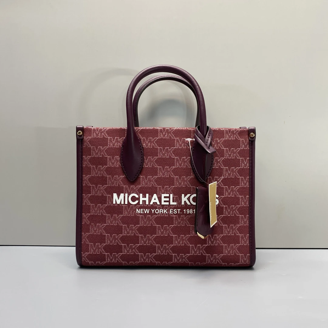 99新 MICHAELKORS/迈克高仕 紫拼老花帆布手提斜挎包 24*19*9cm