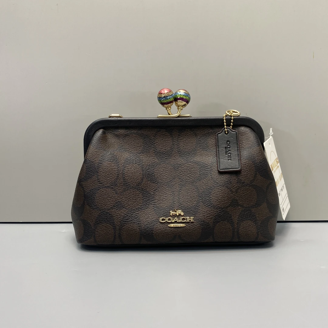 99新 COACH/蔻驰 黑色老花锁吻包20x13x7cmD100907