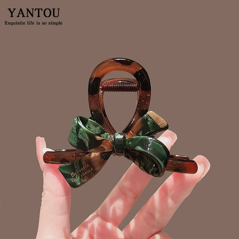 抓夹女高级感2025新款后脑勺盘发发夹蝴蝶结醋酸中号复古鲨鱼发卡