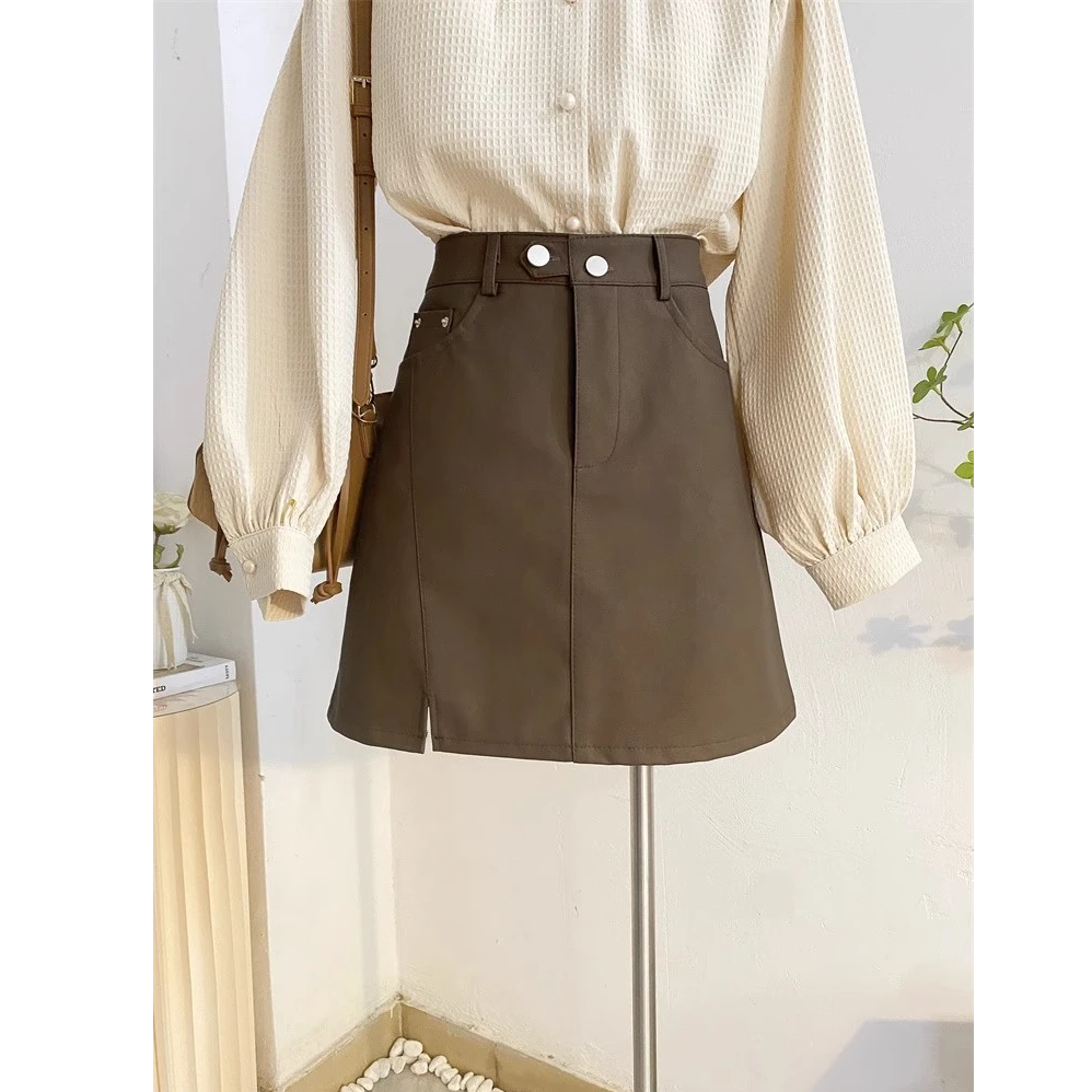 开叉皮裙半身裙女秋冬纽扣设计感高腰a字短裙显瘦防走光pu皮裙子