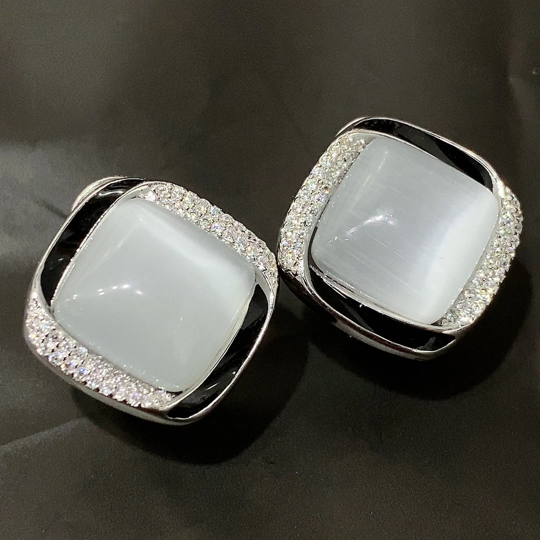 925银合成锆石耳饰 轻奢风螺旋双眼皮合成猫眼石耳排