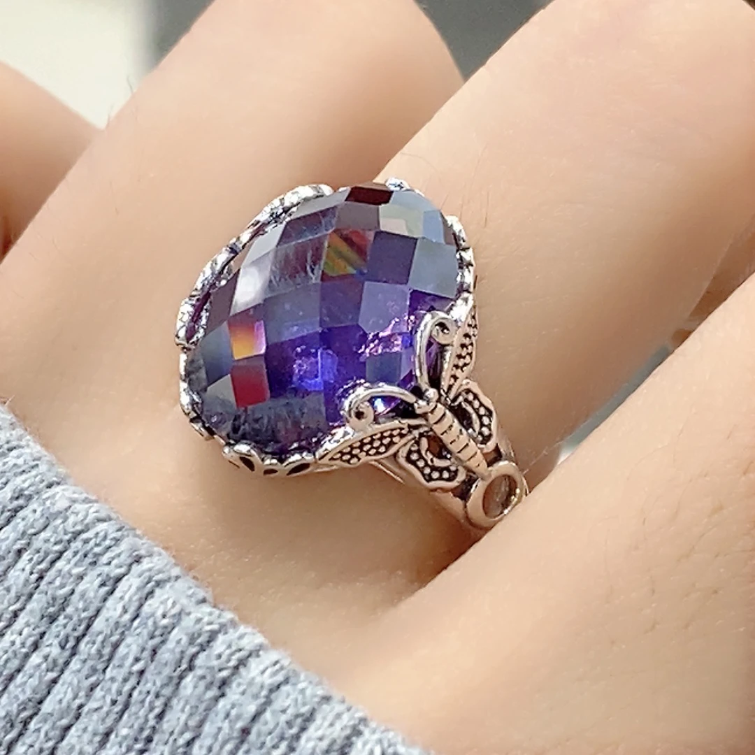 925银合成锆石戒指 复古镂空大蝴蝶切棱紫色锆石戒指