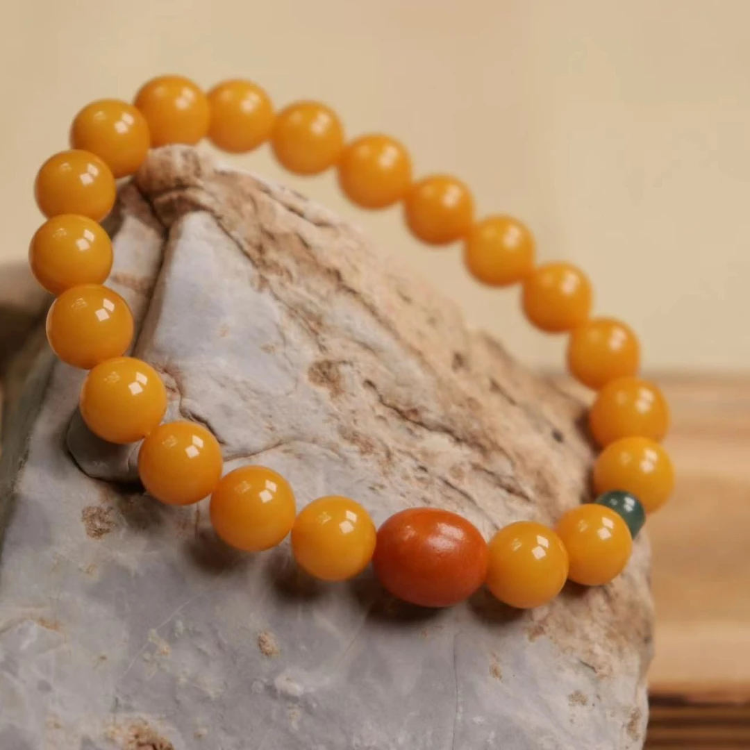 鸡油黄女款蜜蜡手串收藏级S216