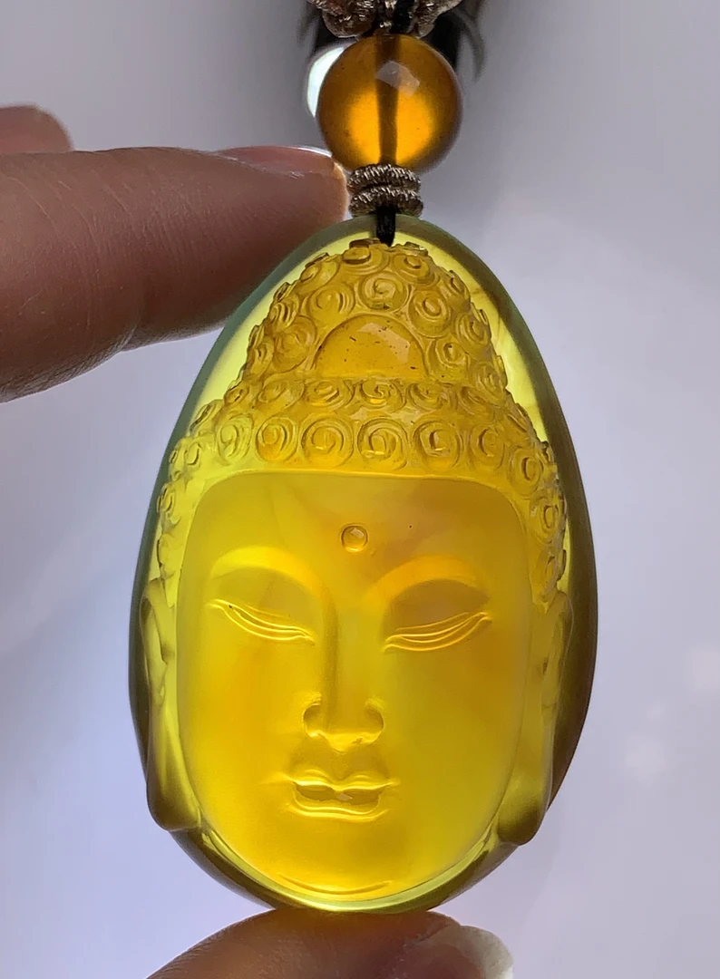 天然缅甸琥珀释迦牟尼佛头吊坠，27克，规格52.5-34.9-28mm