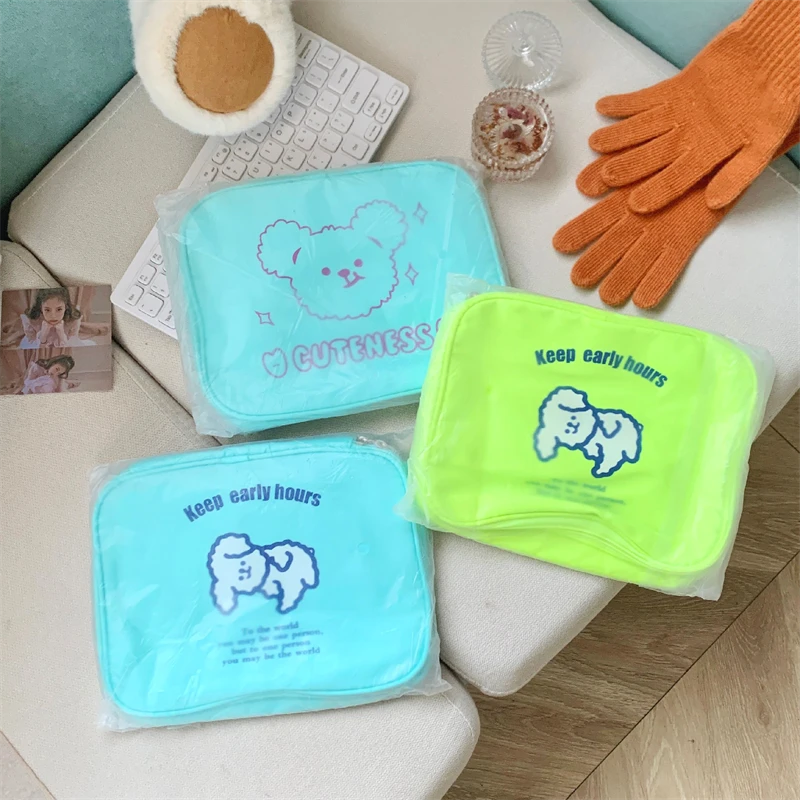 清3月11号一5号发2个！纯色小狗小熊化妆包多功能18X25CM