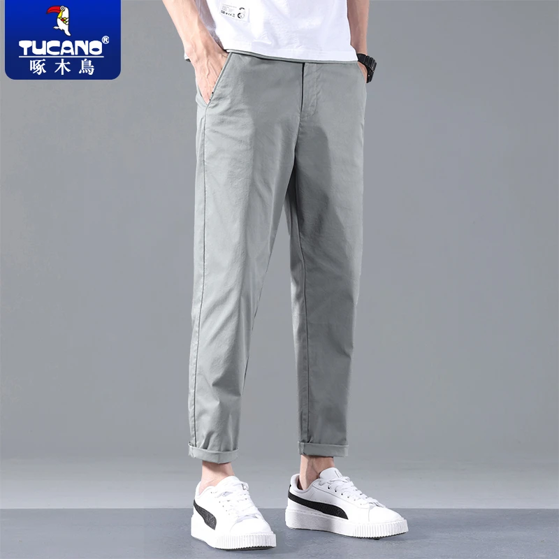 啄木鸟夏季速干休闲裤男士冰丝裤子男户外运动修身小脚裤九分男裤