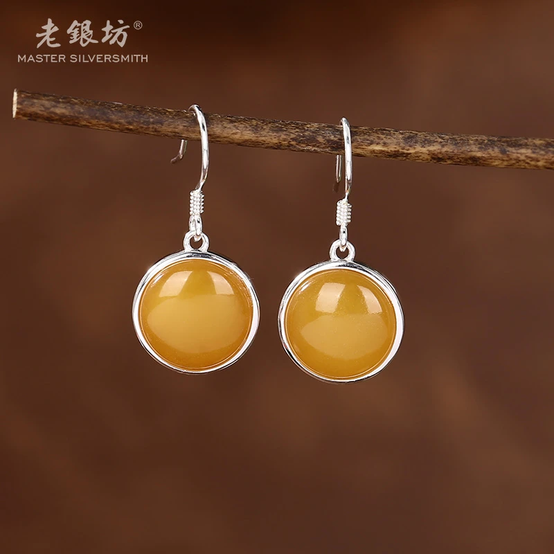 老银坊s925银卷草纹蜜蜡圆牌耳坠 0014625