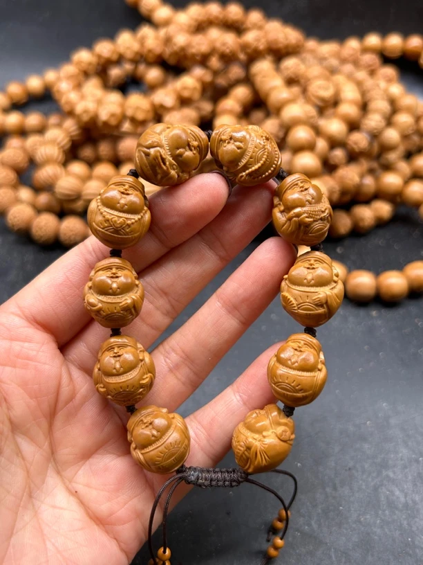 橄榄核雕刻水晶核海派十小光背财神官帽财神