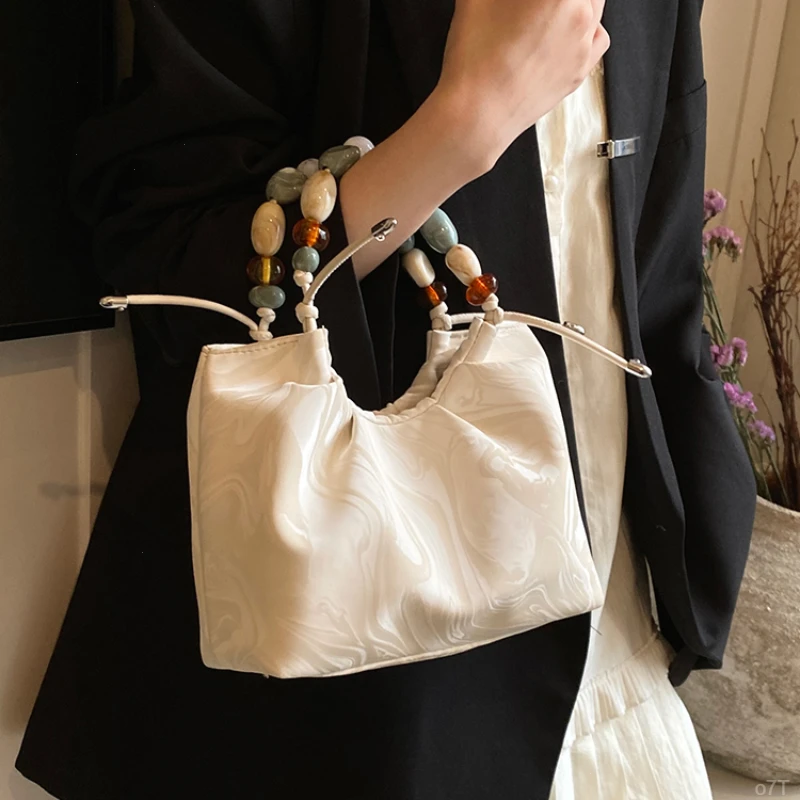 夏天银色包包女2024新款手提水桶包女小众新中式国风单肩斜挎链条