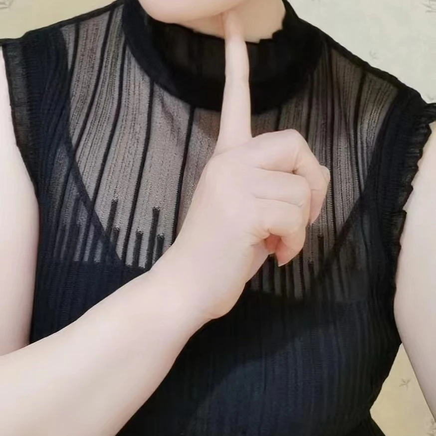 外概念服饰（严选）2春秋新品拼接木耳边镂空背心