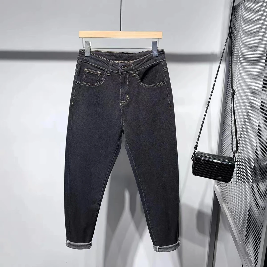 春季新款高弹防褪色经典黑色水洗牛仔裤9063