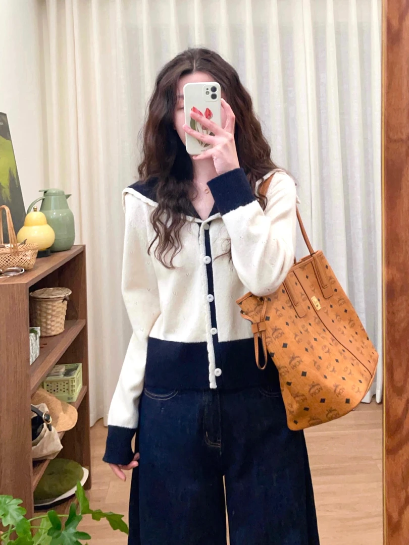 2025春季新款洋气时尚撞色设计感毛衣外套镂空针织上衣牛仔裤套装