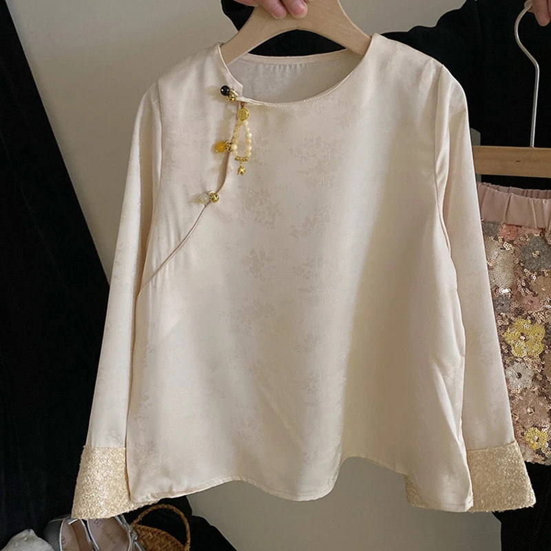 R24105新中式国风上衣2024春新款女童气质亮闪闪拼接长袖盘扣衬衫