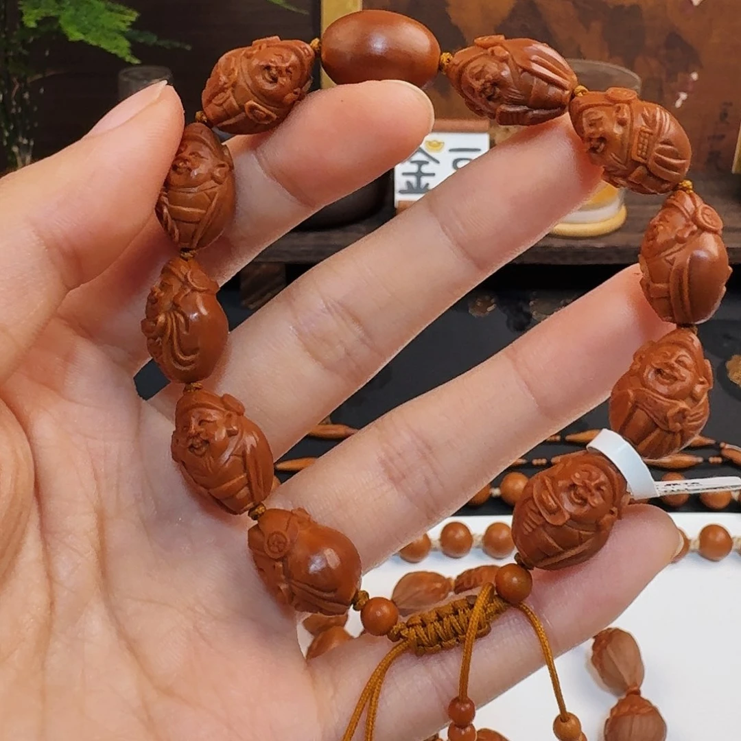 橄榄核核雕纯刀十小财神