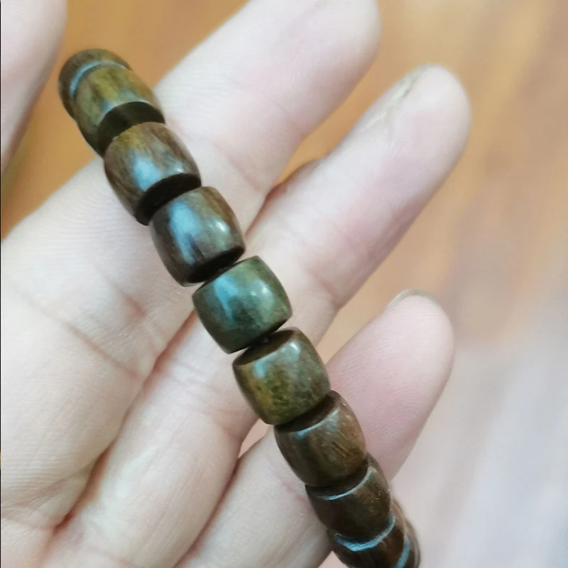 周广胜绿檀圆串镜子