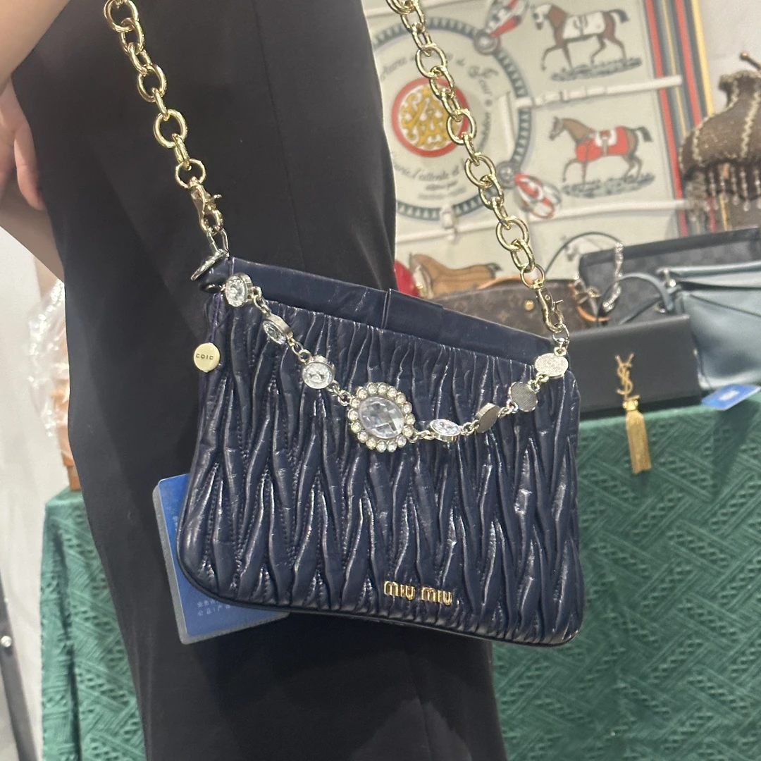 95新 MIU MIU/缪缪 miumiu蓝色手拿包/6579618