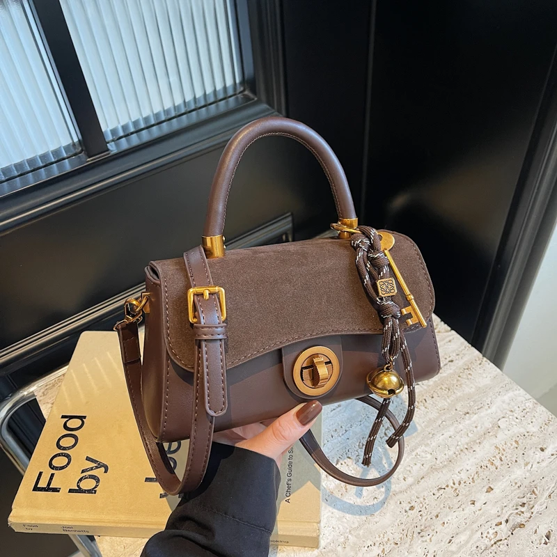 带挂件手提包女2024新款单肩包休闲百搭手提包时尚斜挎包1016