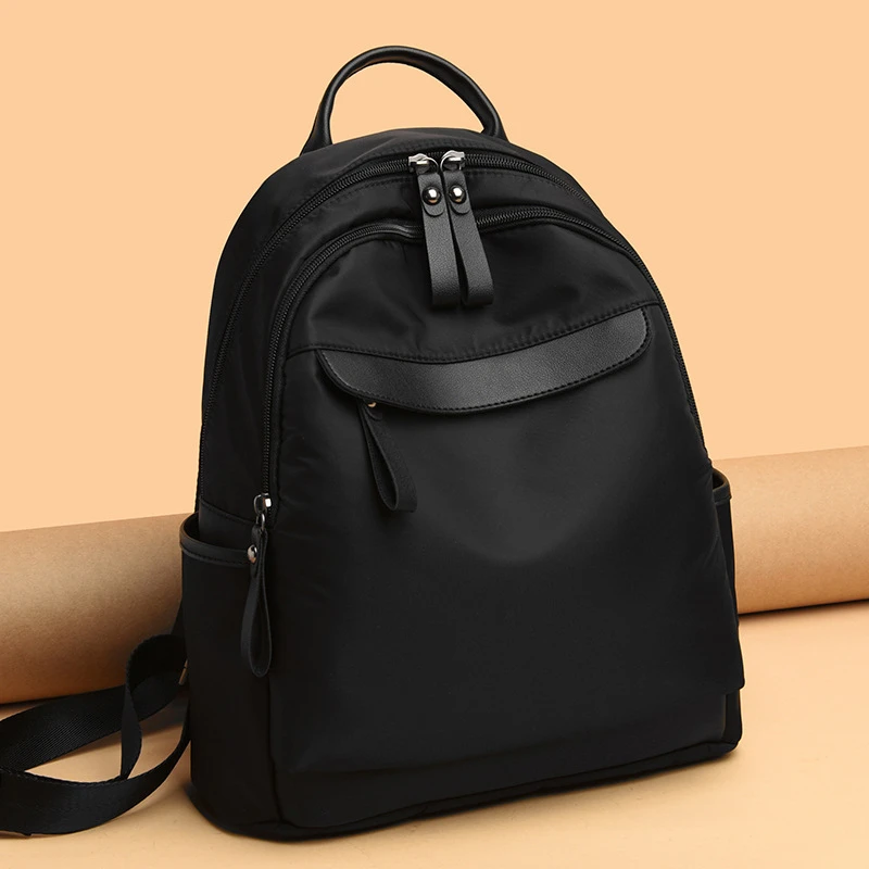 点砚夏季休闲新款时尚大容量书包旅行双肩轻便女牛津布潮