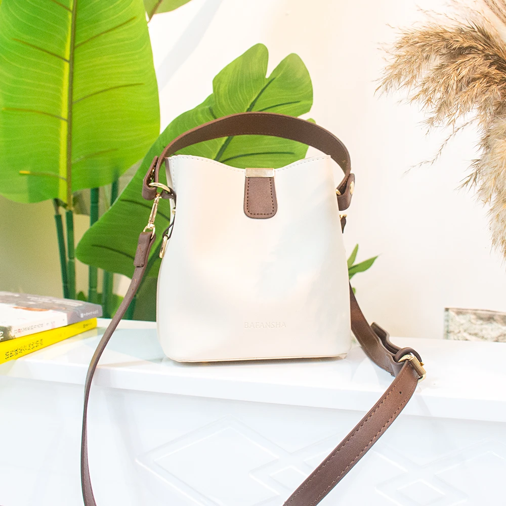 （清货款）真皮水桶包百搭时尚女士简约韩版白色轻奢