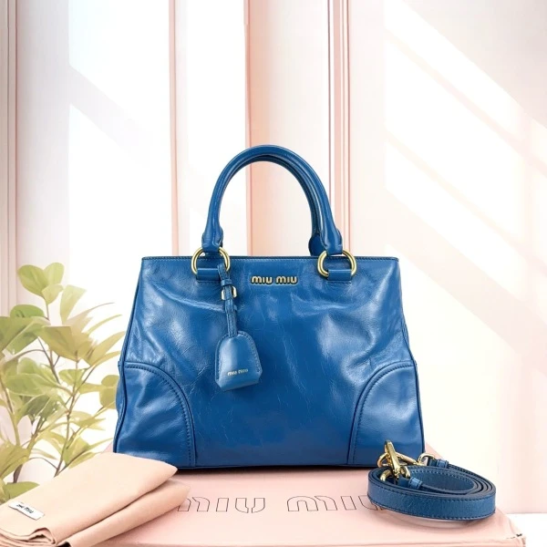 妃鱼/95新/谬谬/MiuMiu/手提包/市场价34000